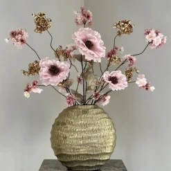 Gouden vaas met zijden bloemen boeket